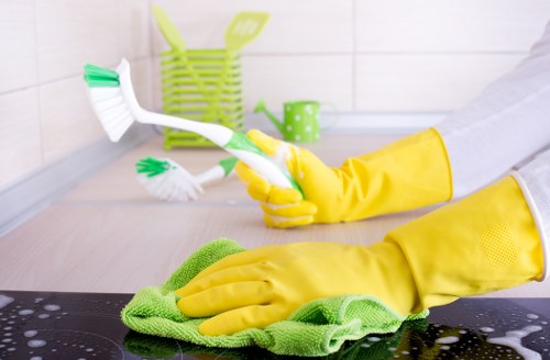 Local carpet cleaning service treating stains on a carpet in Shepherdsbush